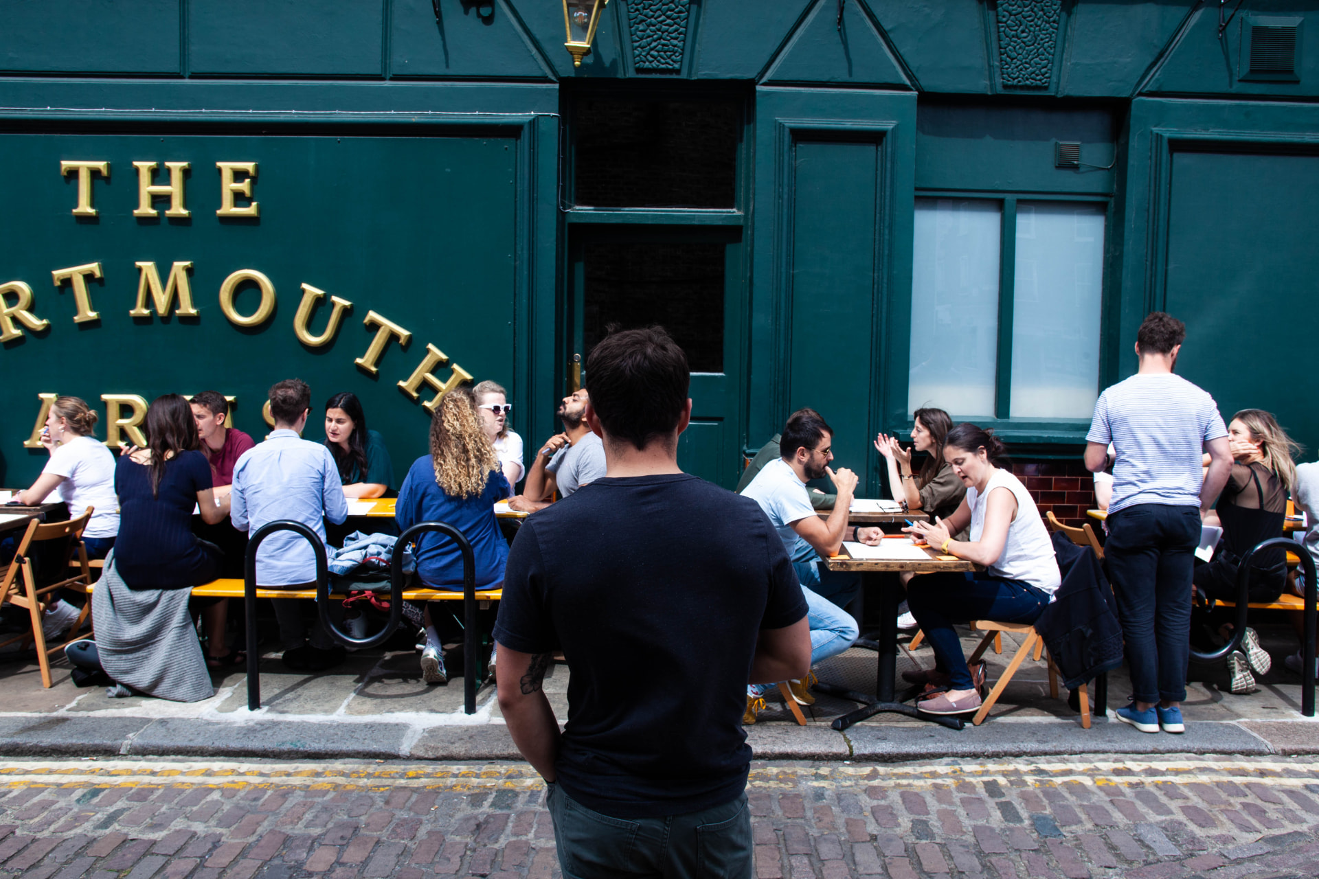 Airbnb teams working together outside a London venue