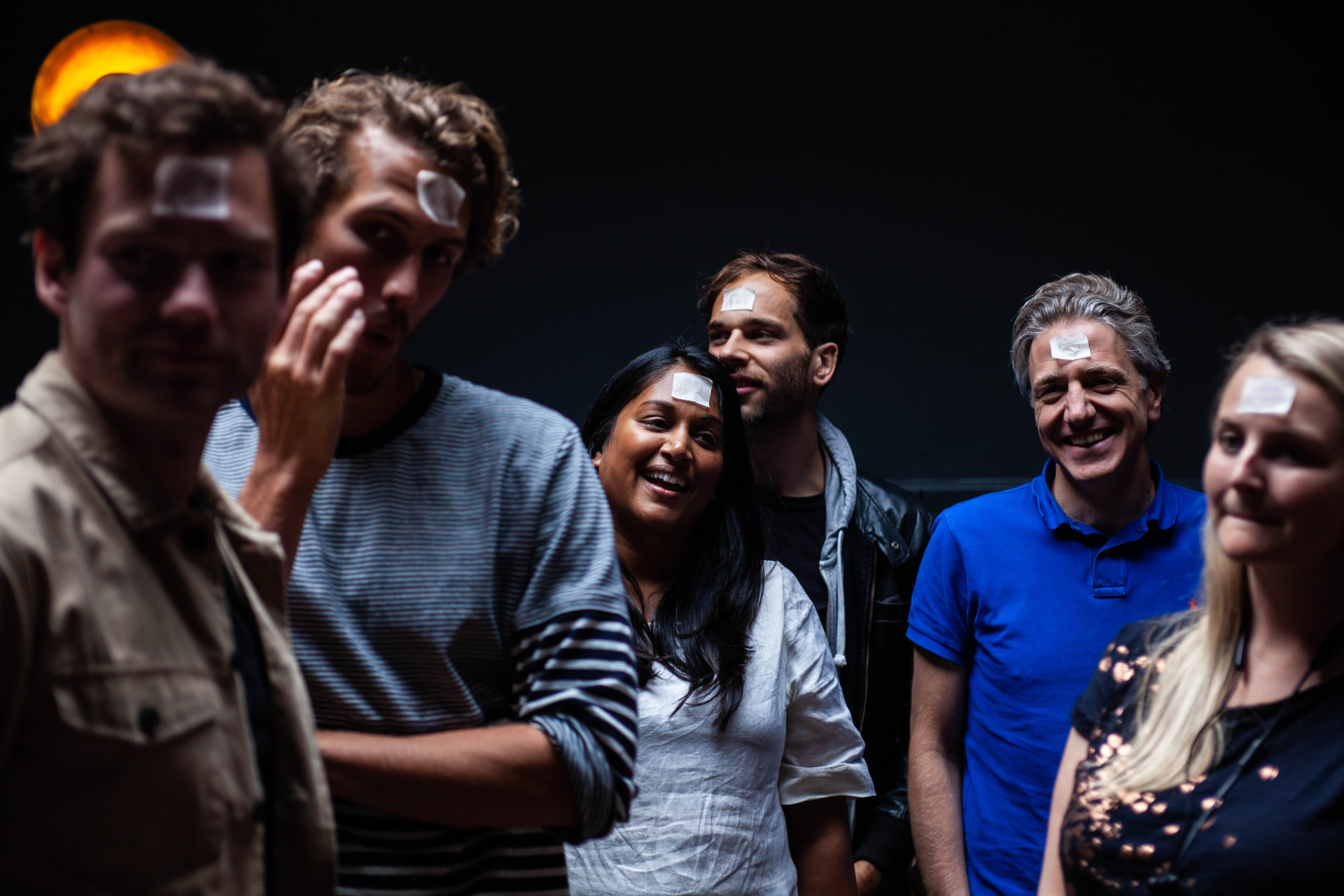 Airbnb participants smiling during a leadership activity